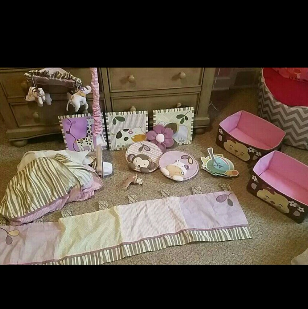 Baby girl jungle theme nursery decor